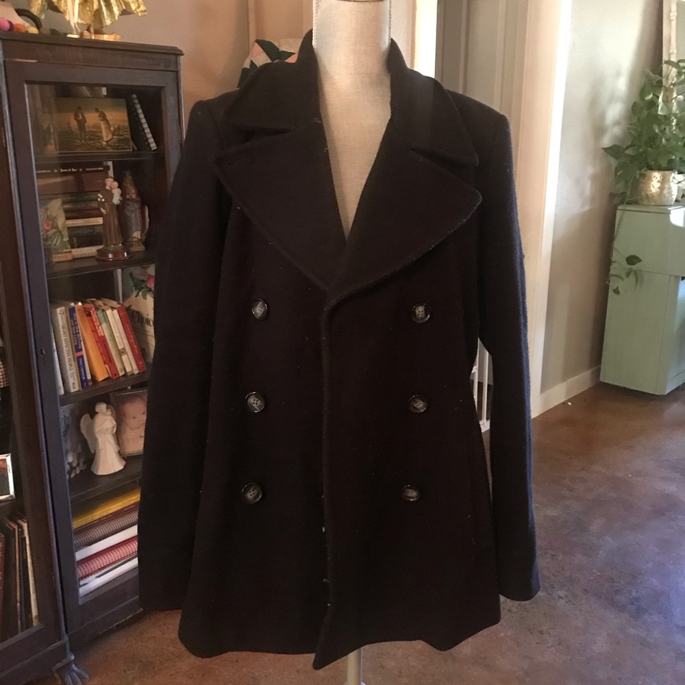A Women’s Black Double-Breasted Peacoat